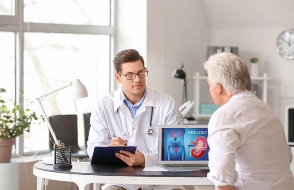 Man talking with urology doctor